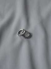 Load image into Gallery viewer, Sterling Silver Circle Diamond Huggies
